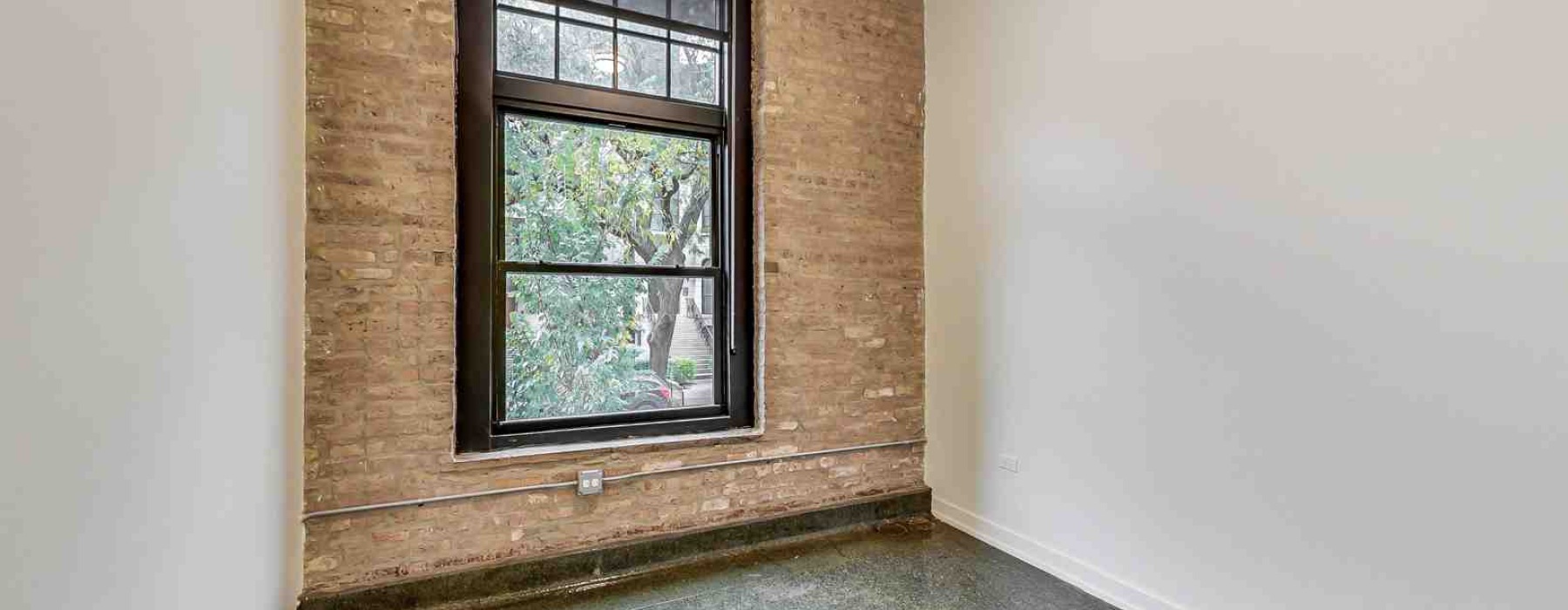 floor to ceiling windows modern apartment living room