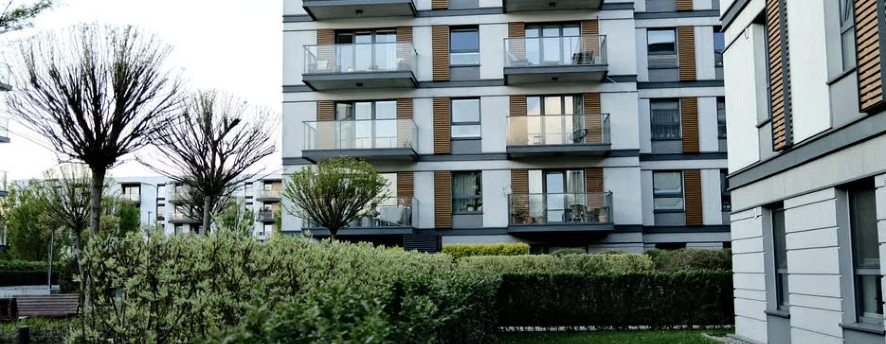 Apartments with community garden lush urban raised beds greenery - Apartments with community garden