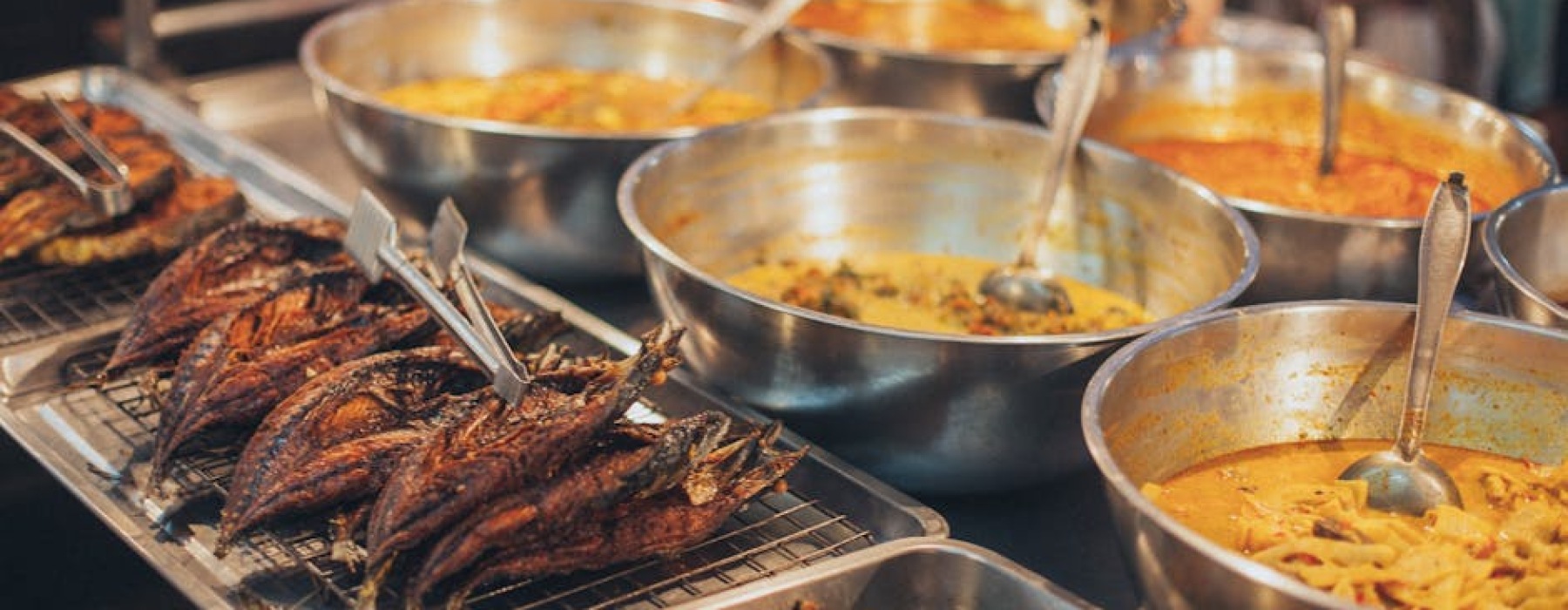 vibrant spread of various Thai dishes - best thai food