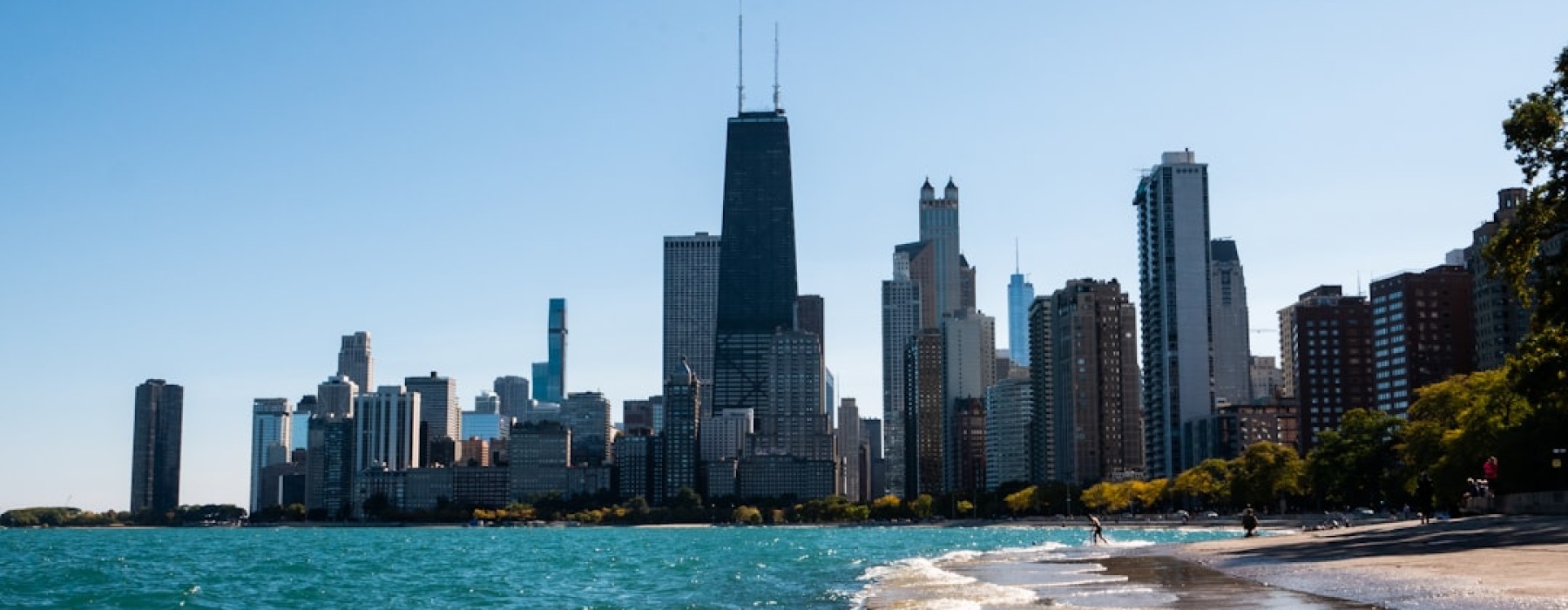 Luxury rentals downtown Chicago skyline at sunset