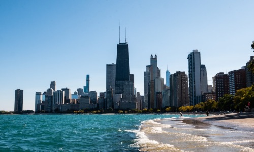 Luxury rentals downtown Chicago skyline at sunset